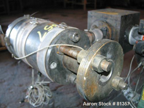 USED: Pipe die, approximately 2-1/2" diameter O.D., 2" I.D. Includes adapter. Last used on a 3-1/2" extruder.