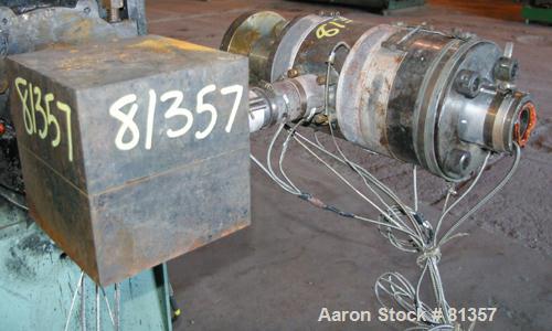 USED: Pipe die, approximately 2-1/2" diameter O.D., 2" I.D. Includes adapter. Last used on a 3-1/2" extruder.