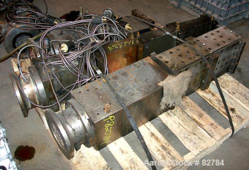 USED: (1) Lot of plastic lumber jacketed die sections. Last used making plastic lumber boards with a 4.5" extruder. These dies were used to make plastic decking parts. 1-1/4" X 5-1/2" Profile deck bo...