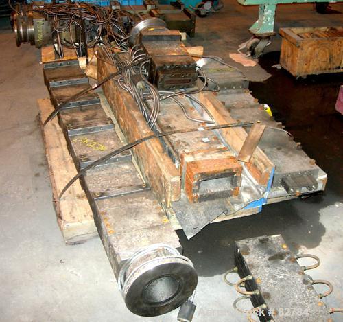 USED: (1) Lot of plastic lumber jacketed die sections. Last used making plastic lumber boards with a 4.5" extruder. These dies were used to make plastic decking parts. 1-1/4" X 5-1/2" Profile deck bo...