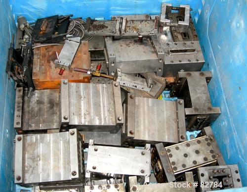 USED: (1) Lot of plastic lumber jacketed die sections. Last used making plastic lumber boards with a 4.5" extruder. These dies were used to make plastic decking parts. 1-1/4" X 5-1/2" Profile deck bo...