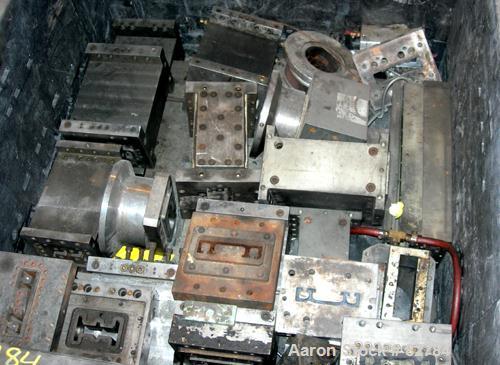 USED: (1) Lot of plastic lumber jacketed die sections. Last used making plastic lumber boards with a 4.5" extruder. These dies were used to make plastic decking parts. 1-1/4" X 5-1/2" Profile deck bo...