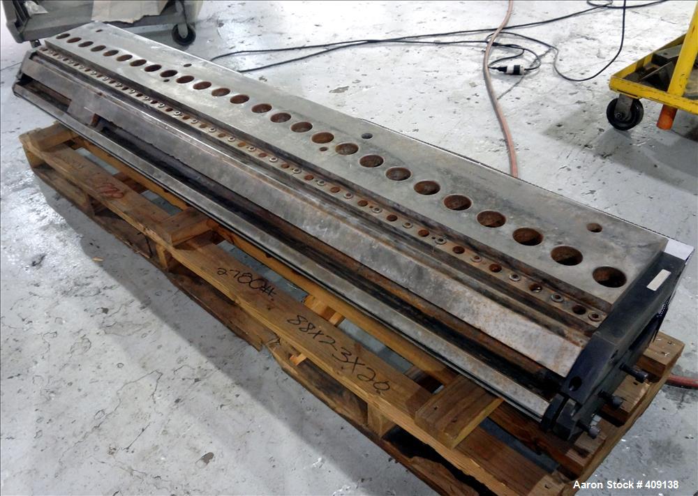 Used 78" wide sheet die. 1" diameter back center feed.