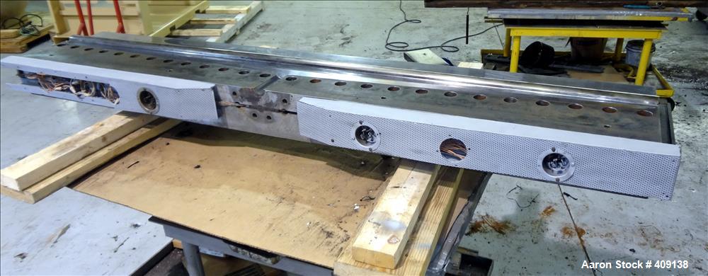 Used 78" wide sheet die. 1" diameter back center feed.