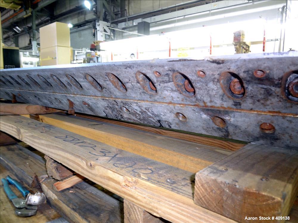 Used 78" wide sheet die. 1" diameter back center feed.