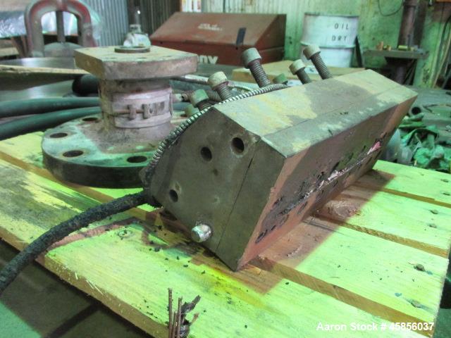 Used Ribbon Slot Die 10". Fed from 1.5" heated feed throat, 8.5" diameter feed side.