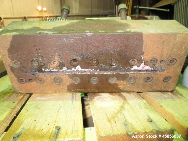 Used Ribbon Slot Die 10". Fed from 1.5" heated feed throat, 8.5" diameter feed side.