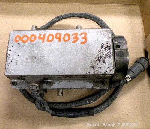 Used Brabender 3/4'' wide strip die. Back center feed. 240 volt, 850 watt.