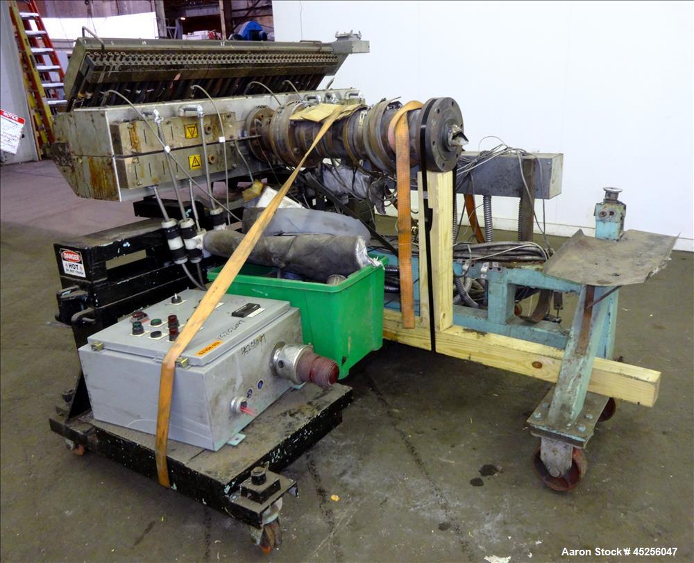 Used Cloeren 54" wide sheet die, back center feed, serial# 05-7969-7, built 2004, mounted on a cart