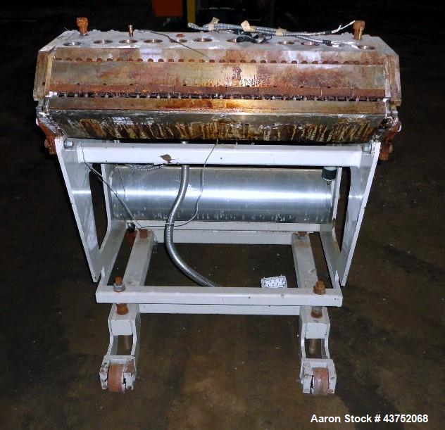 Used EDI 32" Wide Flex Lip Sheet Die, Model H-75. Replaceable bottom lip, no chocker bar. Mounted on a cart. Serial# 93-1553. Last used with a 2.5" extrusion line.