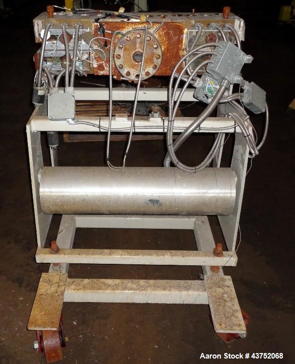Used EDI 32" Wide Flex Lip Sheet Die, Model H-75. Replaceable bottom lip, no chocker bar. Mounted on a cart. Serial# 93-1553. Last used with a 2.5" extrusion line.
