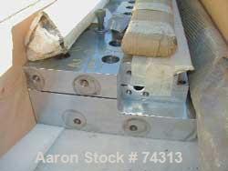 USED: EDI Masterflex sheet die, 38" wide, model R/LD-75. Coat hangardesign, 2" back center feed.