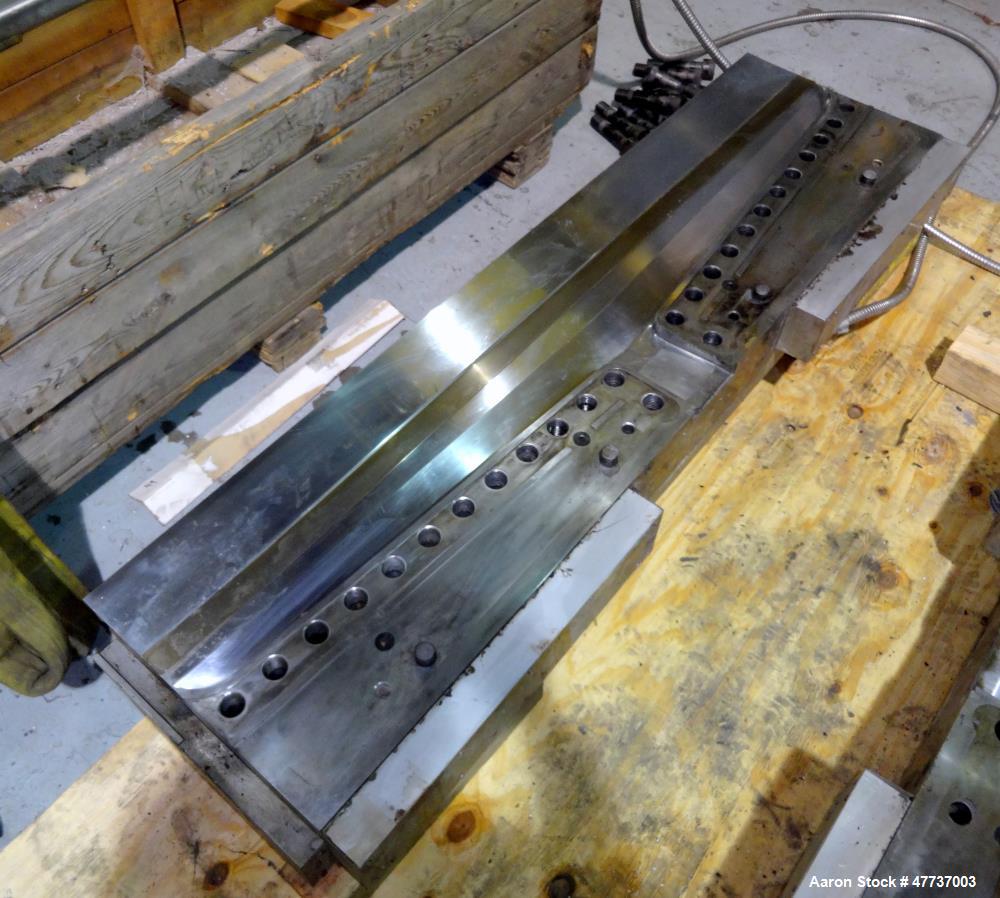 Used EDI Extrusion Dies 64" Wide Ultraflex Fast Gap Extrusion Die, Model UHRC-200. Multiflow 1 manifold design, center manifold width 2.000, end manifold width 1.000, land 1.000, lip opening 0.100 at...