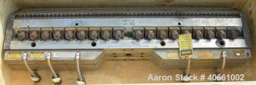 Used EDI Ultraflex R-75, 54" wide die. 1.25" diameter entrance. 1 phase, 230 volt. 3 lower lips with a range of .015" - .090", .085" - .160", and .155" - .230". Includes 1 die lip.