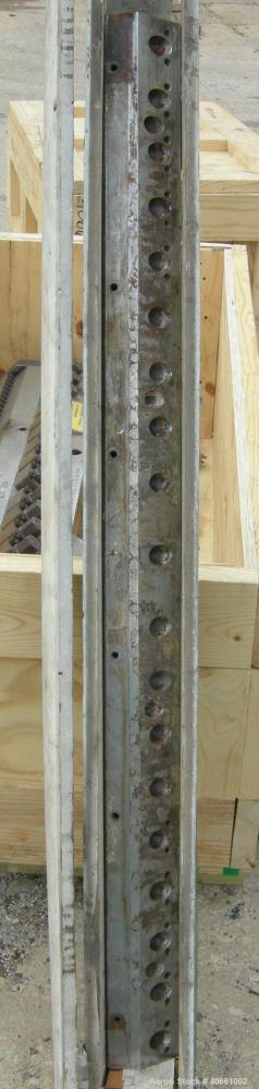 Used EDI Ultraflex R-75, 54" wide die. 1.25" diameter entrance. 1 phase, 230 volt. 3 lower lips with a range of .015" - .090", .085" - .160", and .155" - .230". Includes 1 die lip.