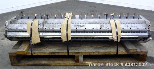 Used EDI 54" Ultraflex Sheet Die, Model R-75. Approximately 1-1/2" diameter back center feed.  Restrictor bar. Openings to 0.375", maximum adjustment range per lower lip 0.075".