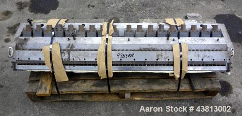Used EDI 54" Ultraflex Sheet Die, Model R-75. Approximately 1-1/2" diameter back center feed.  Restrictor bar. Openings to 0.375", maximum adjustment range per lower lip 0.075".