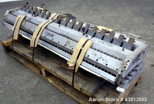 Used EDI 54" Ultraflex Sheet Die, Model R-75. Approximately 1-1/2" diameter back center feed.  Restrictor bar. Openings to 0.375", maximum adjustment range per lower lip 0.075".