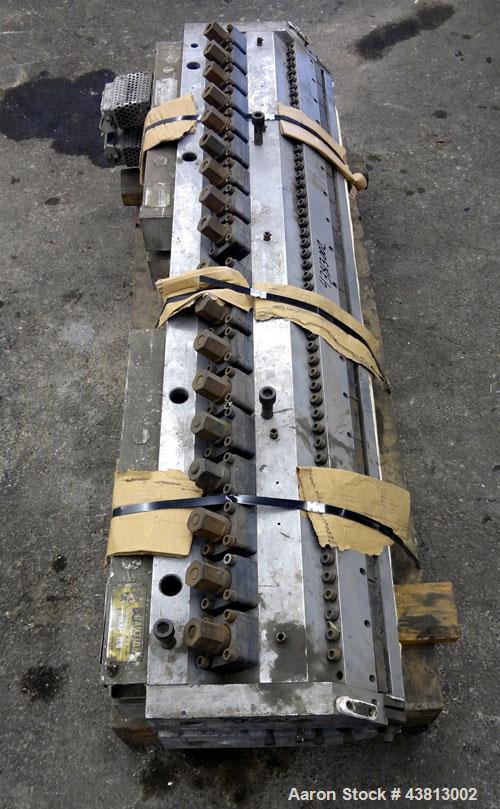 Used EDI 54" Ultraflex Sheet Die, Model R-75. Approximately 1-1/2" diameter back center feed.  Restrictor bar. Openings to 0.375", maximum adjustment range per lower lip 0.075".