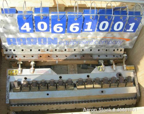 Used EDI 41" Ultraflex R75 wide die. 1 phase, 230 volt. 1.25" diameter entrance. Lip opening range .001" - .075". Includes 8 die lips.