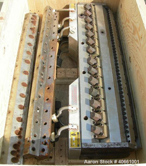 Used EDI 41" Ultraflex R75 wide die. 1 phase, 230 volt. 1.25" diameter entrance. Lip opening range .001" - .075". Includes 8 die lips.