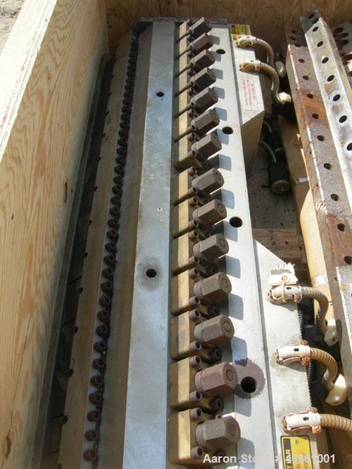 Used EDI 41" Ultraflex R75 wide die. 1 phase, 230 volt. 1.25" diameter entrance. Lip opening range .001" - .075". Includes 8 die lips.