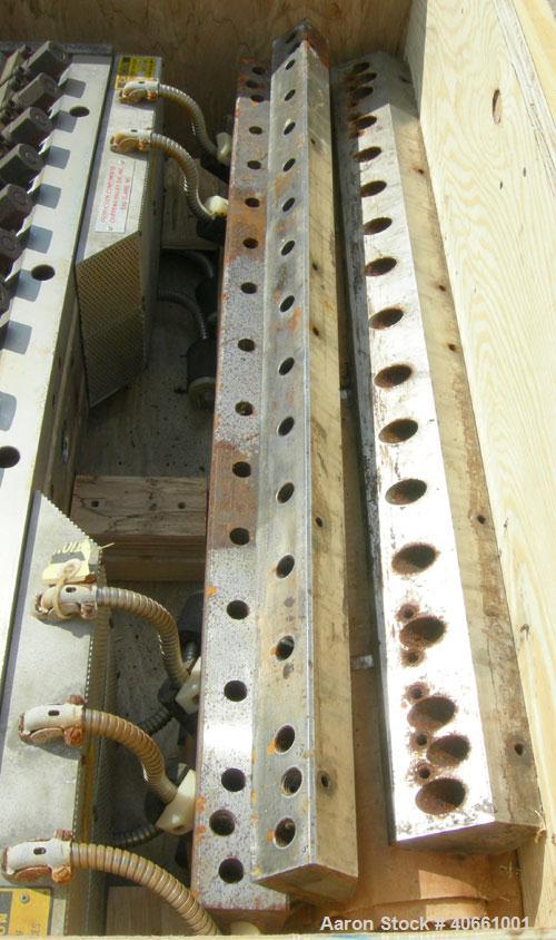 Used EDI 41" Ultraflex R75 wide die. 1 phase, 230 volt. 1.25" diameter entrance. Lip opening range .001" - .075". Includes 8 die lips.