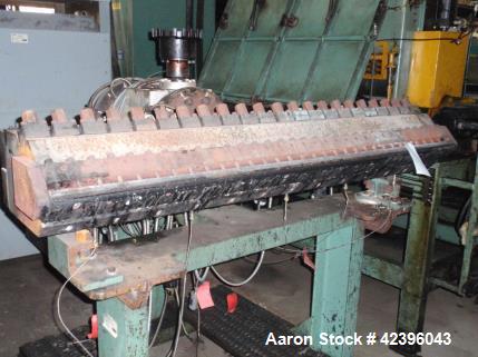 Used EDI 64" sheet die, adjustable upper lip, restrictor bar, back center feed, 240 volt, on stand, serial#04-23947-01.