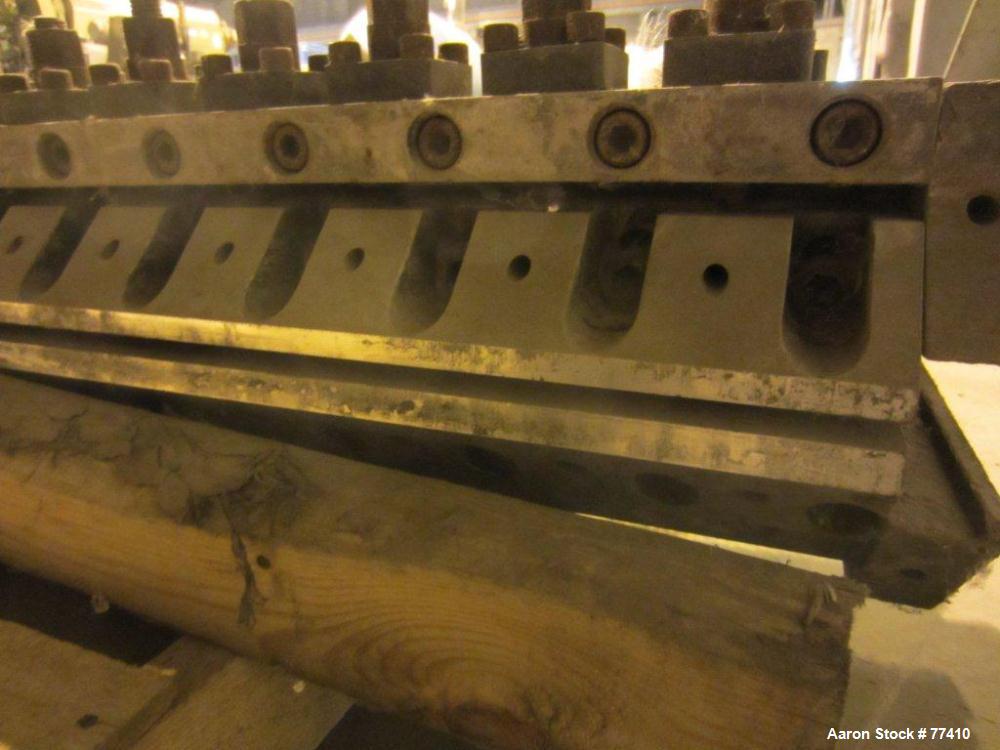 USED: EDI 66" wide H.D. sheet die. 3/4" diameter back center feed.