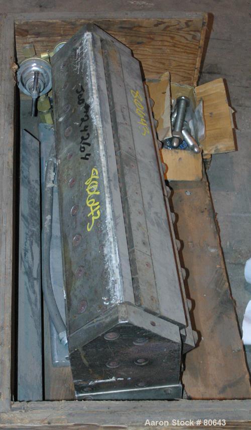 USED: 30" wide sheet die with restrictor bar, back center feed, electrically heated.