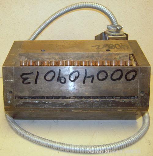 Used Sheet Die, 8" wide. 15-5 PH stainless steel. 1" back center feed.