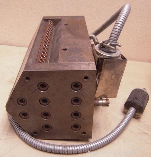 Used Sheet Die, 8" wide. 15-5 PH stainless steel. 1" back center feed.