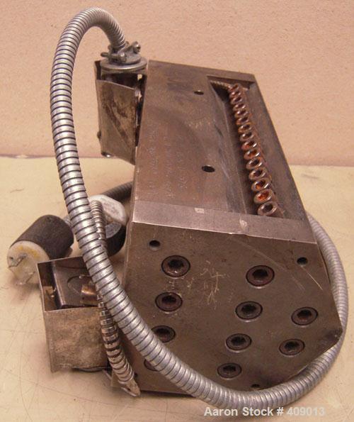 Used Sheet Die, 8" wide. 15-5 PH stainless steel. 1" back center feed.