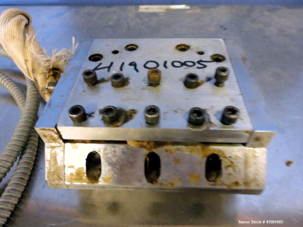 Used 4.5'' Wide Sheet Die. Back center feed.