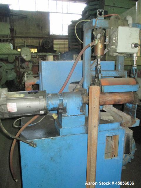 Used Berlyn 14" Wide Dual Lip Air Wipe. Includes an approximate 2hp blower and 12" wide pull roll assembly with 1hp motor. On base.