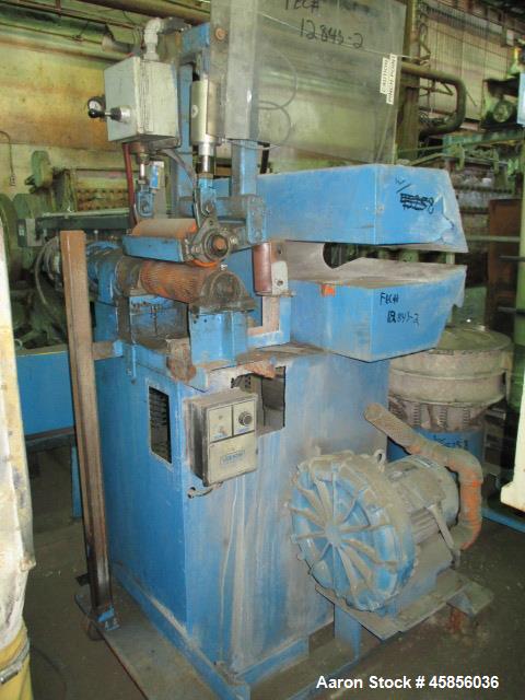 Used Berlyn 14" Wide Dual Lip Air Wipe. Includes an approximate 2hp blower and 12" wide pull roll assembly with 1hp motor. On base.