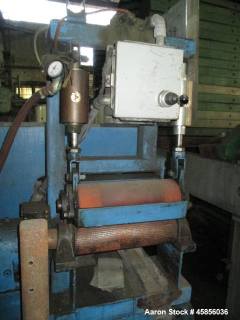 Used Berlyn 14" Wide Dual Lip Air Wipe. Includes an approximate 2hp blower and 12" wide pull roll assembly with 1hp motor. On base.