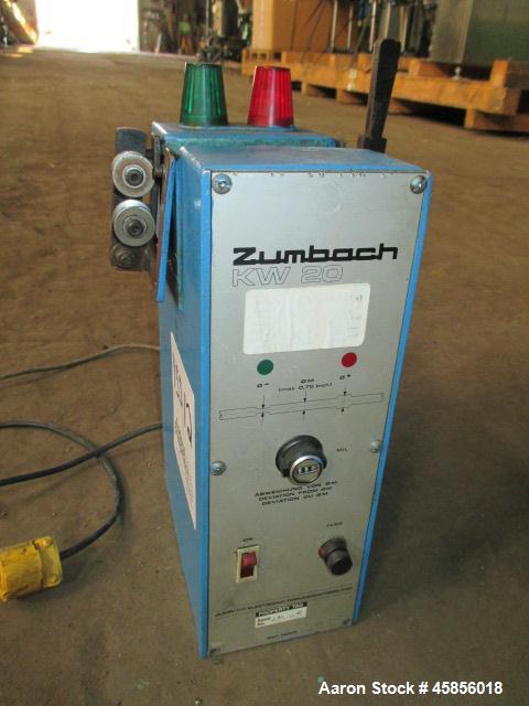Used- Zumbach Surface Fault Detector, Model KW20. 2.5" Wide aperture with 2" wide opening with idler rollers, serial #3002.