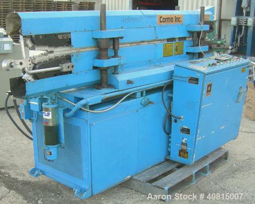 Used Corma Corrugator, Model 120HSL. Maximum line speed 125 feet per minute, approximate 3/4" mold blocks. Driven by an approximate 5 hp motor. Includes a Powertec drive panel.