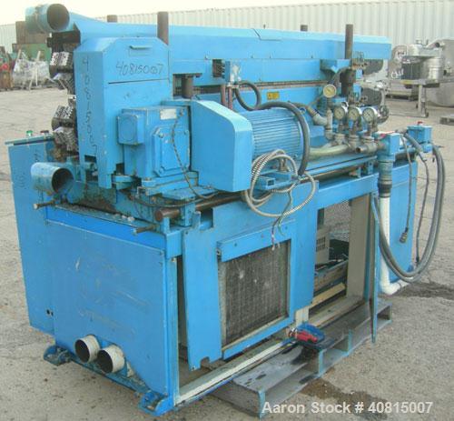 Used Corma Corrugator, Model 120HSL. Maximum line speed 125 feet per minute, approximate 3/4" mold blocks. Driven by an approximate 5 hp motor. Includes a Powertec drive panel.