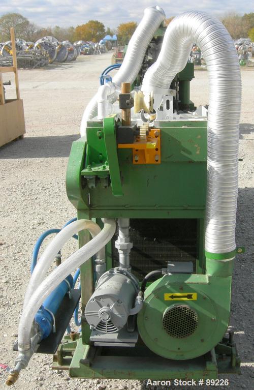 USED: Corma corrugator, model 200. Includes cooling tank with pump, heat exchanger and blowers.