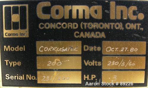 USED: Corma corrugator, model 200. Includes cooling tank with pump, heat exchanger and blowers.