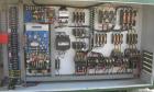 USED: Corma corrugator, model 200. Includes cooling tank with pump, heat exchanger and blowers.