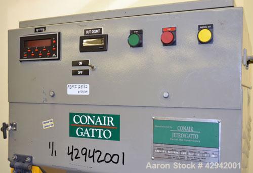 Used Conair/Gatto Fly Knife Cutter, Model ESC-20A. Approximate capacity 2’’ O.D. maximum. Driven by a 2hp, 3/60/460 volt motor. Mounted on a base with (4) adjustable legs.