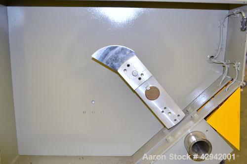 Used Conair/Gatto Fly Knife Cutter, Model ESC-20A. Approximate capacity 2’’ O.D. maximum. Driven by a 2hp, 3/60/460 volt motor. Mounted on a base with (4) adjustable legs.