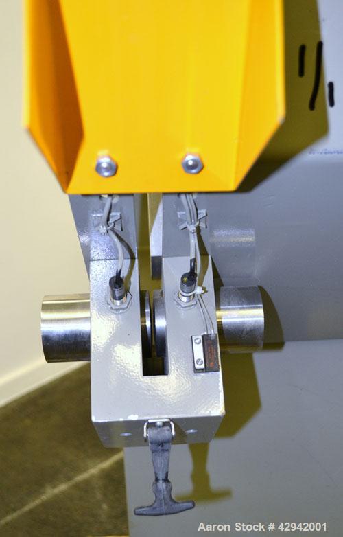 Used Conair/Gatto Fly Knife Cutter, Model ESC-20A. Approximate capacity 2’’ O.D. maximum. Driven by a 2hp, 3/60/460 volt motor. Mounted on a base with (4) adjustable legs.
