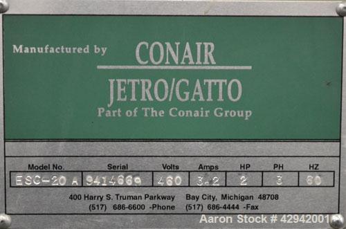 Used Conair/Gatto Fly Knife Cutter, Model ESC-20A. Approximate capacity 2’’ O.D. maximum. Driven by a 2hp, 3/60/460 volt motor. Mounted on a base with (4) adjustable legs.
