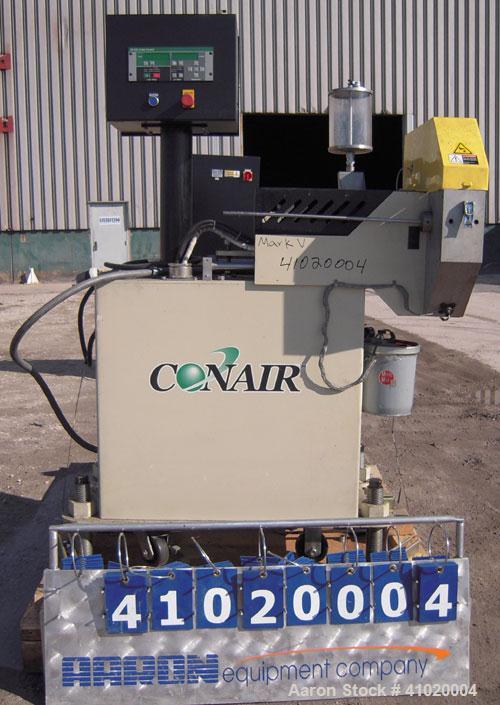Used Conair Traveling Fly Knife Cutter, Model SCE-2L. Driven by an approximate 2 1/2 hp motor. Includes an LE-650 Cutter Control digital display. Mounts on casters.