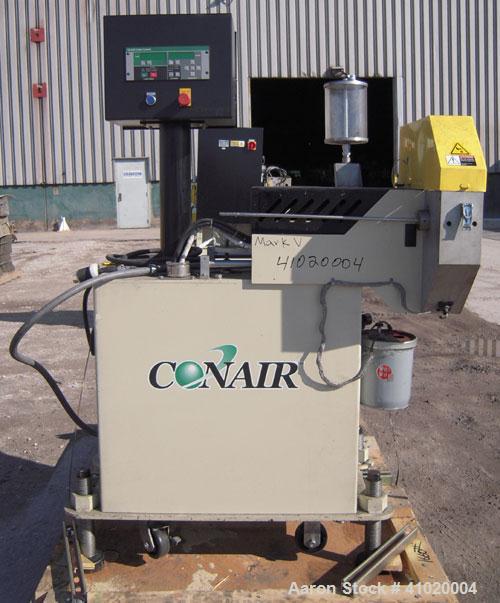 Used Conair Traveling Fly Knife Cutter, Model SCE-2L. Driven by an approximate 2 1/2 hp motor. Includes an LE-650 Cutter Control digital display. Mounts on casters.