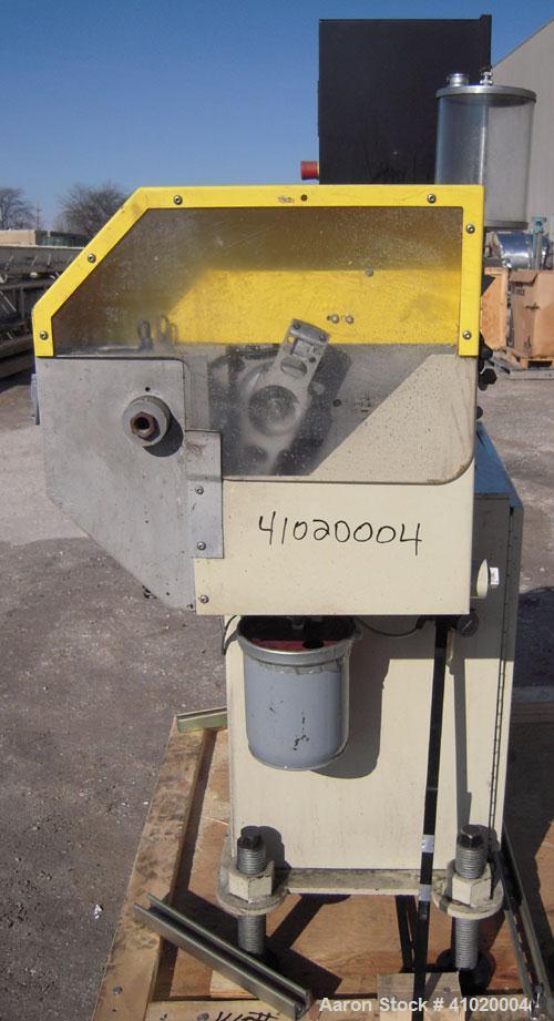 Used Conair Traveling Fly Knife Cutter, Model SCE-2L. Driven by an approximate 2 1/2 hp motor. Includes an LE-650 Cutter Control digital display. Mounts on casters.